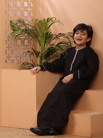 Nabia Black Solid Thobe / Jubba with White Piping Detailing For Kids Boys